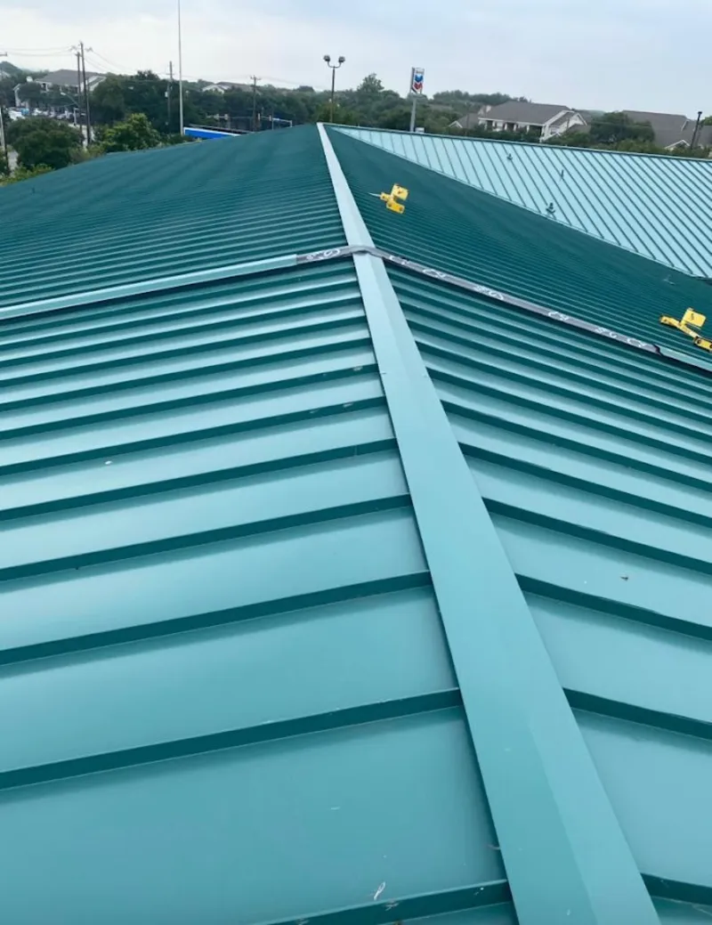 Green commercial metal roof ridge and valley for Metal Roof Repair in Homeland